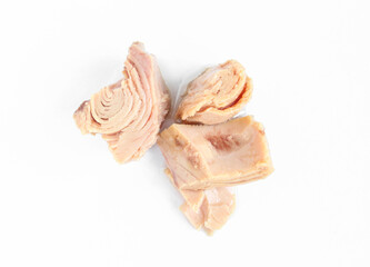 Pieces of tuna isolated on white background. Preserved and prepared fish meat