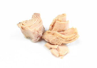 Pieces of tuna isolated on white background. Preserved and prepared fish meat
