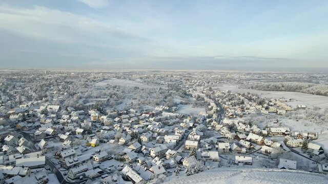 Scenic View Of Offenburg Near Vineyards Of Ortenberg, Baden-Wuerttemberg, Germany During Snowfall Winter Season. - Aerial Drone Shot 