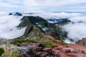 Above the clouds on the mountain peak Pico Ruivo on Madeira Island - Cloud Covered Mountain...