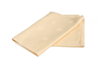 Orange folded napkin isolated on white background