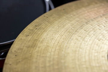 Closeup of drumsticks lying on the professional drum set. Drummer equipment. 