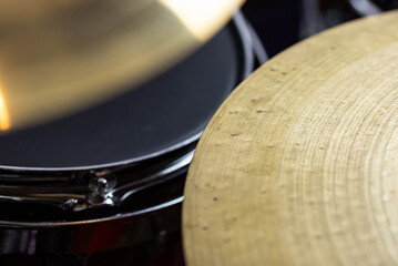 Closeup of drumsticks lying on the professional drum set. Drummer equipment. 