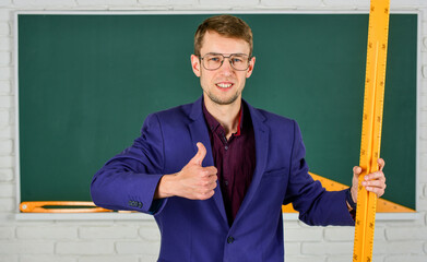 mathematics and people concept. man at blackboard. back to school. Towards knowledge. geometry...