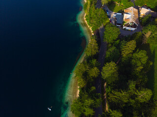 Breathtaking view of the famous Bohinj lake from above. Beautiful view ot the Triglav mountains, Triglav national park, and the church of St John the Baptist,.Slovenia, Europe