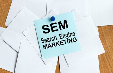 SEM (Search Engine Marketing), text on a sticker on the table