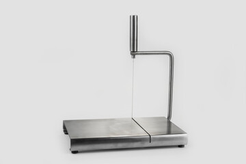 Wire Hand kitchen Cheese slicer cutter on a white