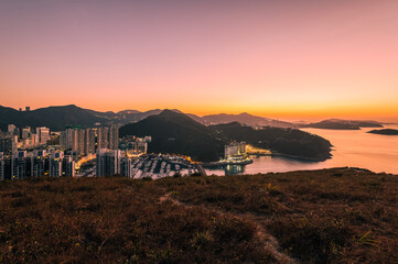 Camping on mountain top, enjoy view of sunrise at Yuk Kwai Shan (Mount Johnson) located in Ap Lei Chau,Hong Kong.