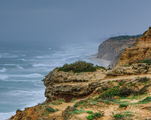 Arsuf cliff, a kurkar sandstone cliff reserve towering high above the Mediterranean sea coastline between Herzliya and Netanya towns, Israel.