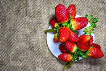 strawberries on a wooden background