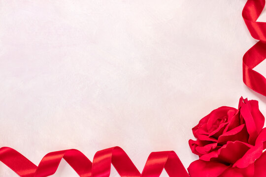 Red Rose and Ribbons Flat Lay Photo