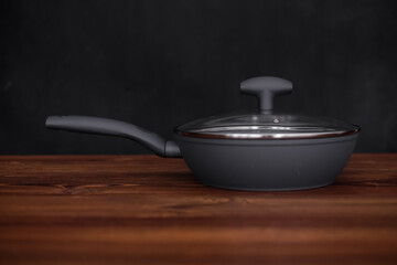 grill pan on wooden table background