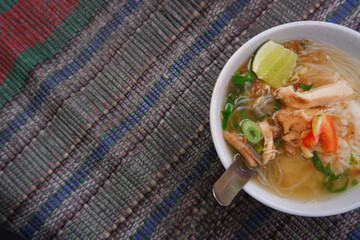 Indonesian traditional food. Soto Semarang from Central Java with additional vegetable cuts
