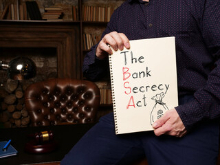 The Bank Secrecy Act BSA is shown on the conceptual photo using the text