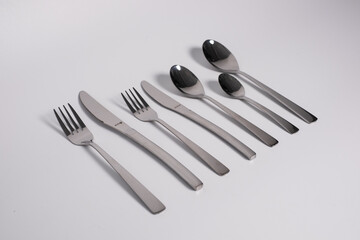 set of knives, spoons and forks isolated on a white background