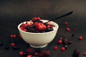 natural yogurt and red berries