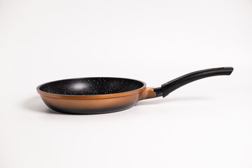 brown frying pan isolated on a white background