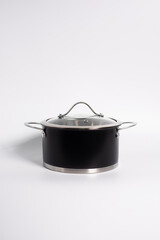 Stainless steel stewpot on white background