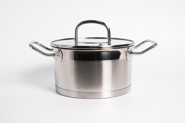 Stainless steel stewpot on white background