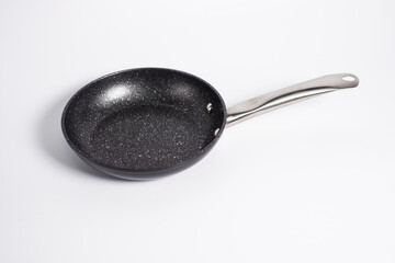 black frying pan isolated on a white background