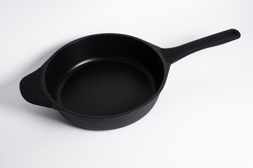 black grill pan isolated on a white background