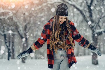 Winter young woman portrait. Beauty Joyful Model Girl laughing and having fun in winter park. Beautiful young female outdoors, Enjoying nature, wintertime - 410719472