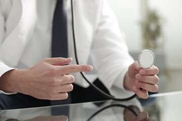 Doctor holding a stethoscope in his hand