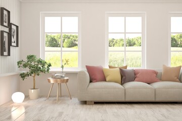White living room with sofa and summer landscape in window. Scandinavian interior design. 3D illustration