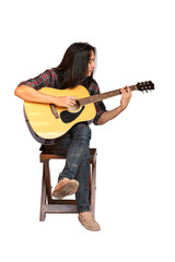 Portrait handsome young male guitarist with long hair sitting and playing acoustic guitar. Asian long-haired man playing acoustic guitar isolated on white background.