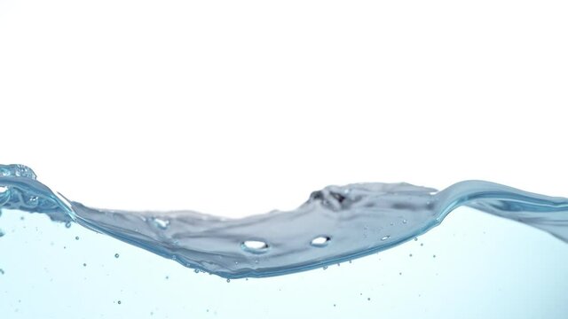 Super Slow Motion Shot of Water Surface at 1000fps on White Background.