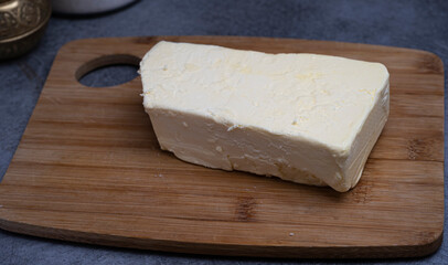 a piece of white cow butter
