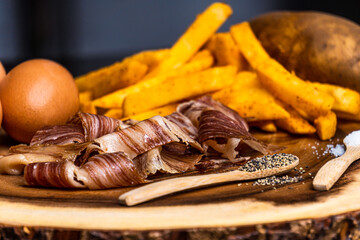 Acorn fed iberico ham and raw fries and egg