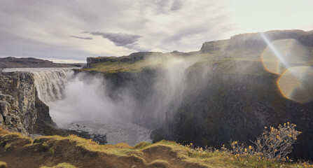 Majestic view of the Dettifoss waterfall at sunset