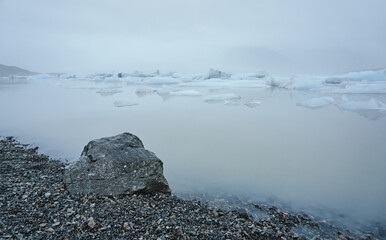 Lake with ice and fog. Jokulsarlon Glacial Lake
