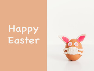 Easter egg bunny wearing mask.