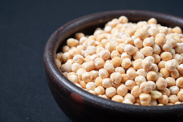 raw chickpeas in clay dish