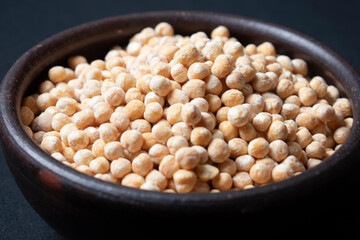 raw chickpeas in clay dish