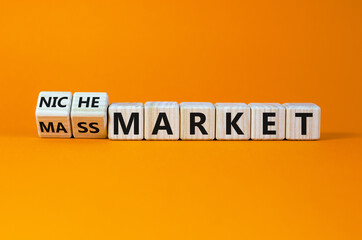 Mass or niche market symbol. Turned wooden cubes and changed words 'mass market' to 'niche market'....