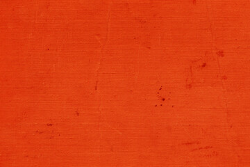 Cardboard red abstract pattern texture close-up. Retro old paper background. Grunge concrete wall. Vintage blank wallpaper.
