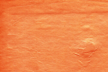 Fototapeta premium Cardboard red abstract pattern texture close-up. Retro old paper background. Grunge concrete wall. Vintage blank wallpaper.