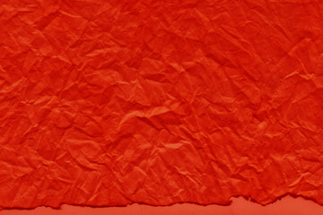 Fototapeta premium Cardboard red abstract pattern texture close-up. Retro old paper background. Grunge concrete wall. Vintage blank wallpaper.