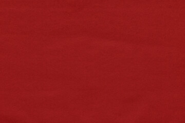 Cardboard red abstract pattern texture close-up. Retro old paper background. Grunge concrete wall. Vintage blank wallpaper.