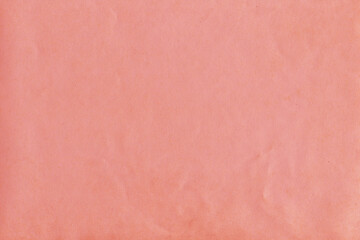 Cardboard red abstract pattern texture close-up. Retro old paper background. Grunge concrete wall. Vintage blank wallpaper.