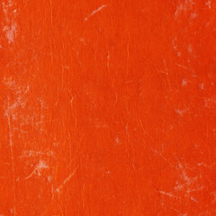 Cardboard red abstract pattern texture close-up. Retro old paper background. Grunge concrete wall. Vintage blank wallpaper.