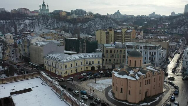 Europe, Kiev, Ukraine - February 2021: Aerial view of the Podil area, Kontraktova square. Old residential buildings overlooking the city.
