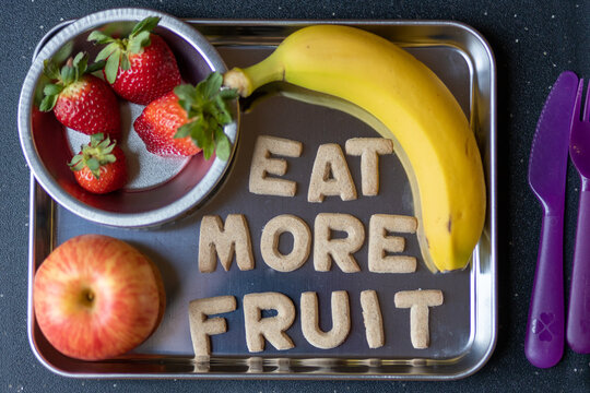 Fruit Snack Tray with Strawberries, Apples, Bananas with Cookies spelling "Eat More Fruit"