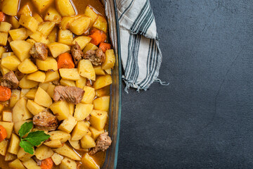 stewed potatoes and meat roast vegetables goulash portion on the table for healthy meal snack...