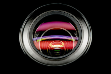 Photo Camera lens top view, isolated on black background