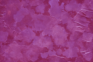 Fototapeta premium Cardboard red abstract pattern texture close-up. Retro old paper background. Grunge concrete wall. Vintage blank wallpaper.