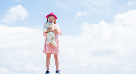 cute kid in dress hold teddy bear toy, childhood
